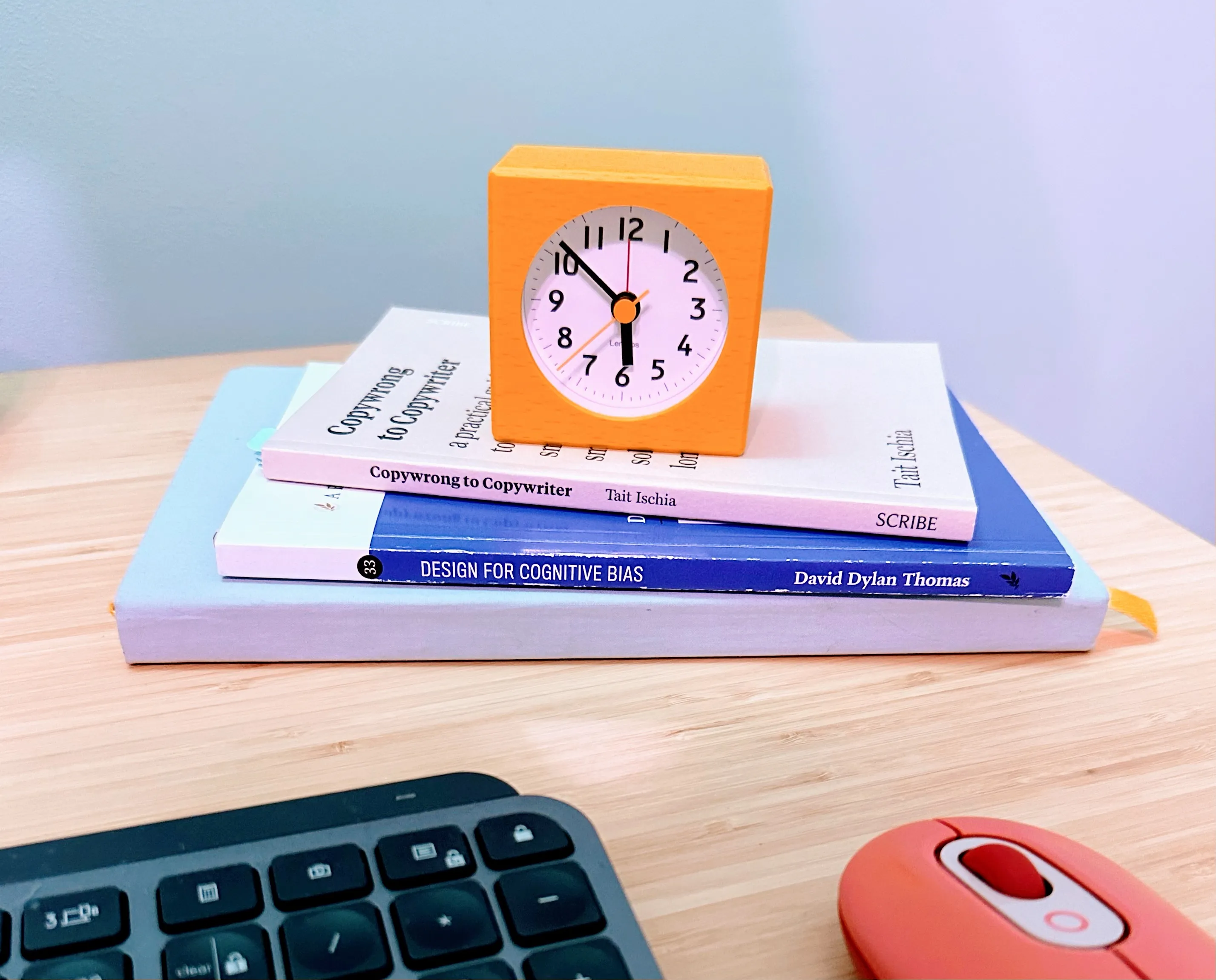 Stack of books with a clock